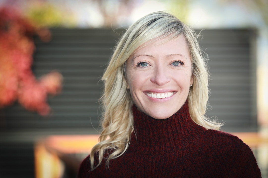 Portrait,Of,A,Mature,Woman,Smiling,At,The,Camera